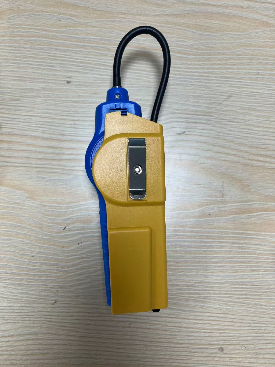 SF6 leak detector side view with belt clip
